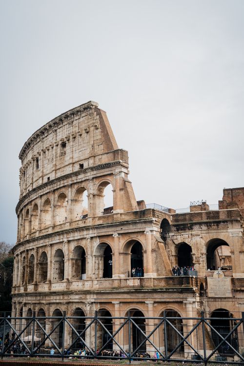 Free Historic view of the Colosseum in Rome, showcasing ancient architecture and Roman history. Stock Photo