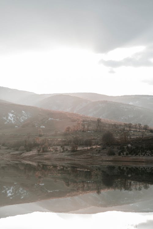 View of a Lake and Hills in the Distance 