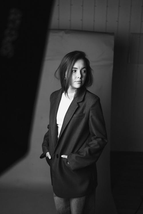 Black and White Studio Shot of a Young Woman in a Jacket 