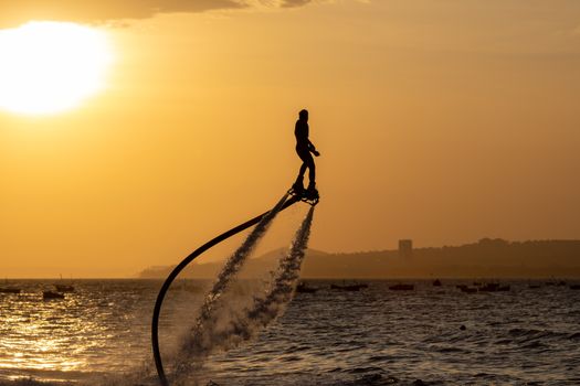 Man Hydroflying at Golden Hour