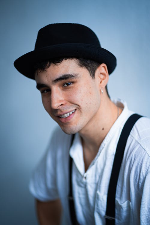 Model in a Black Fedora and White Shirt