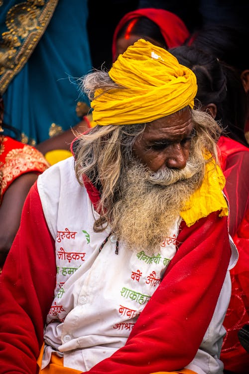 Elderly Man with Beard Sitting in Turban