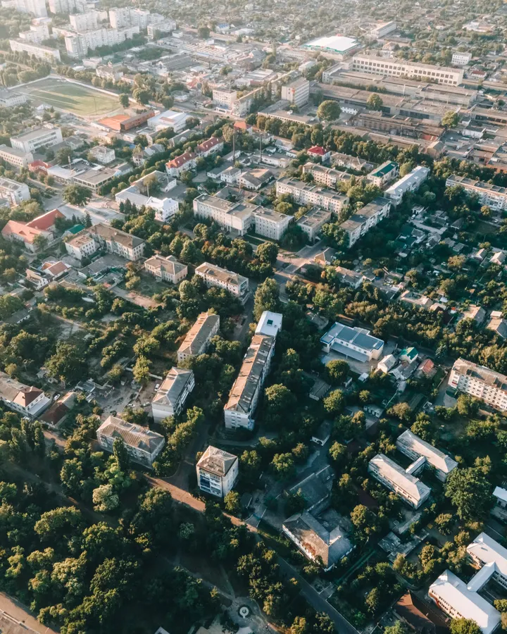 Refrigerator repair in College Area, CA Aerial view of a city with residential buildings, roads and greenery, like the College Area near SDSU