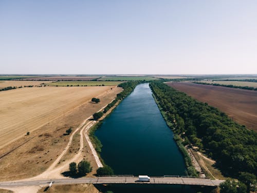 River on Plains with Fields