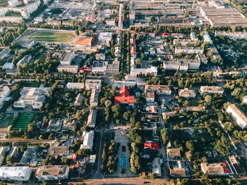 An aerial view of a city with lots of trees