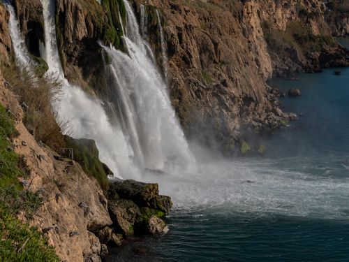 Free Breathtaking view of the Lower Duden Waterfalls cascading into the Mediterranean Sea in Antalya, Turkey. Stock Photo
