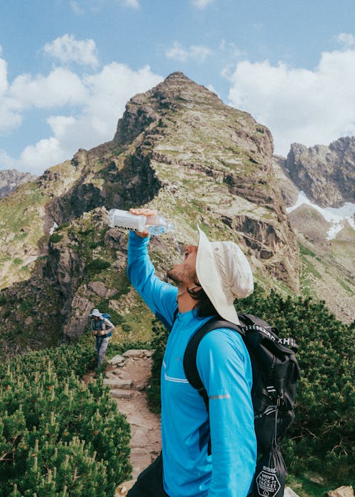 Gratis stockfoto met backpack, bergen, bergketen