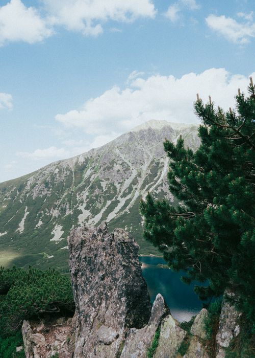 Free Breathtaking view of Czarny Staw lake with Tatra mountains in Poland. Nature at its finest. Stock Photo