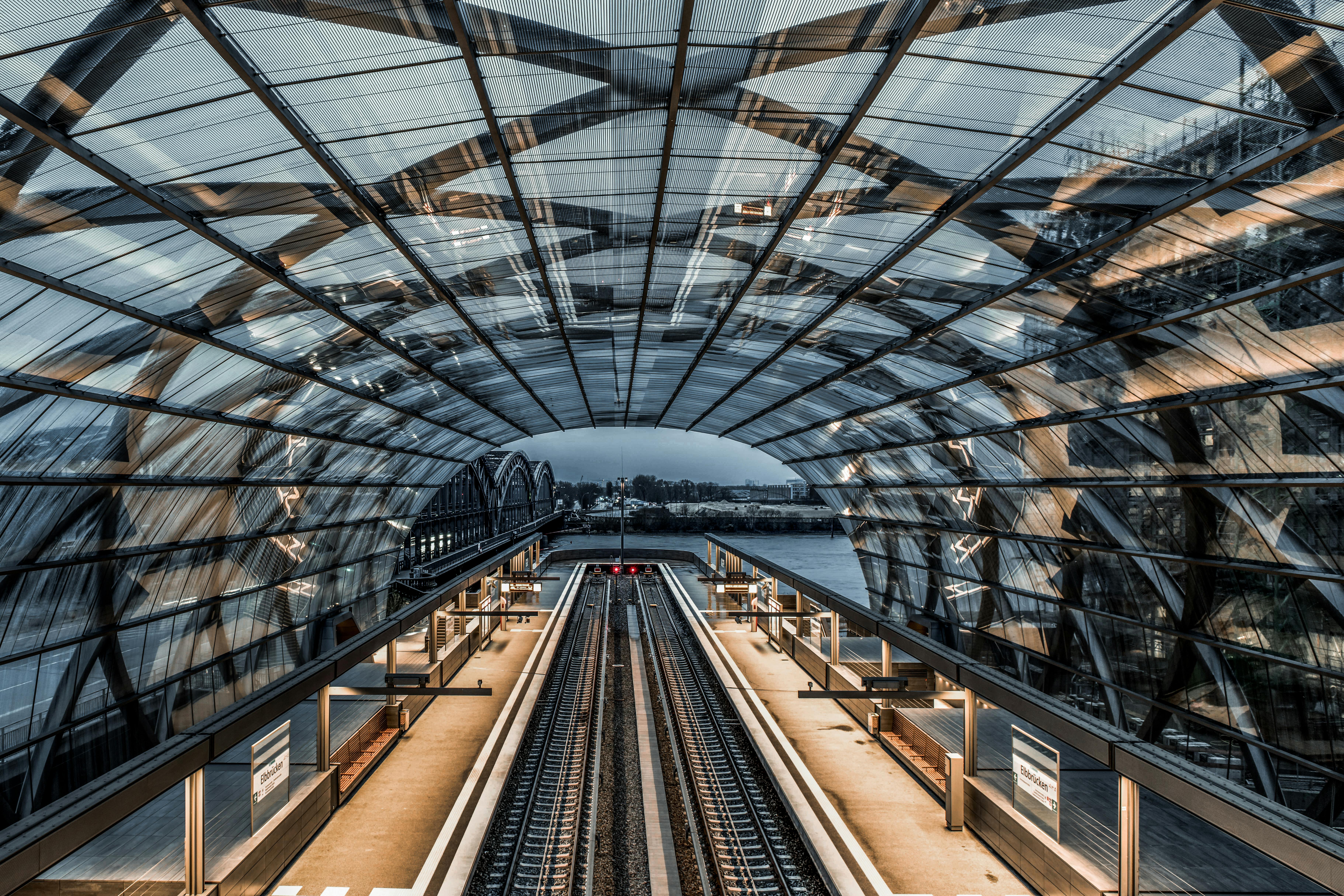 Aerial view of a modern railway station in Hamburg, Germany, featuring contemporary architecture.
