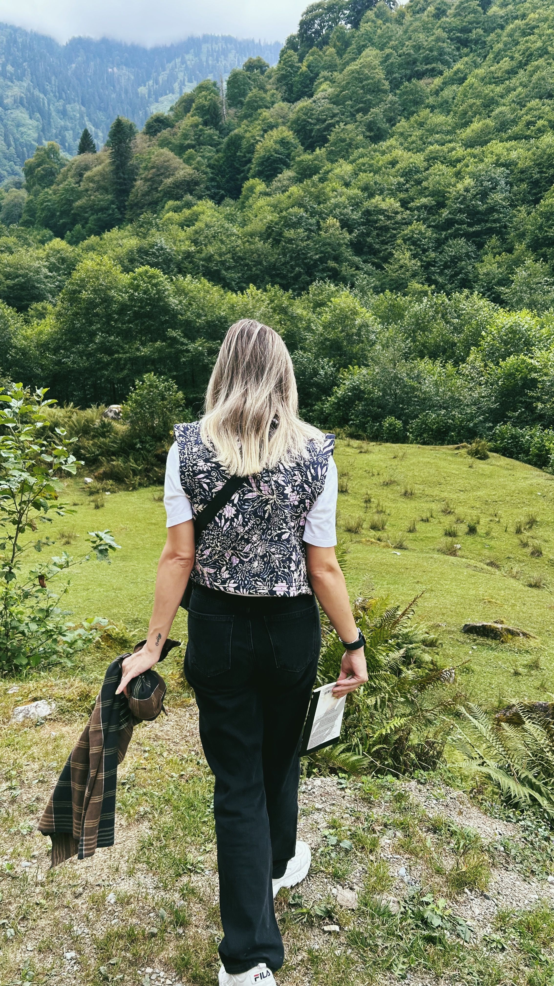 Back View of Walking Woman in Valley · Free Stock Photo