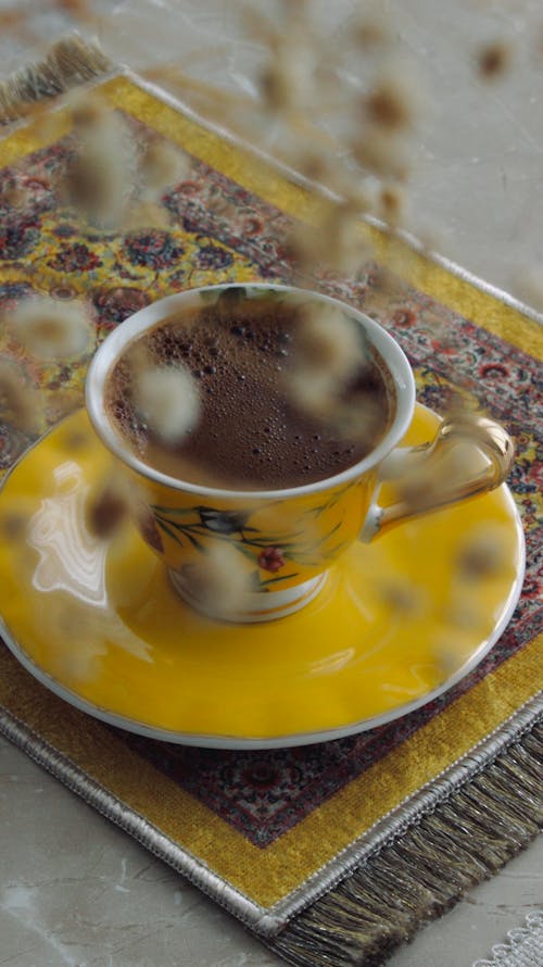 Close-up of Coffee in a Yellow Cup 