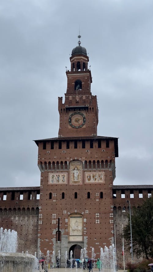 A large brick building with a clock tower