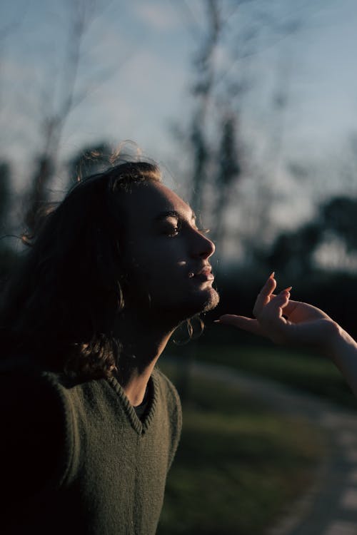 Woman Hand Touching Man Chin