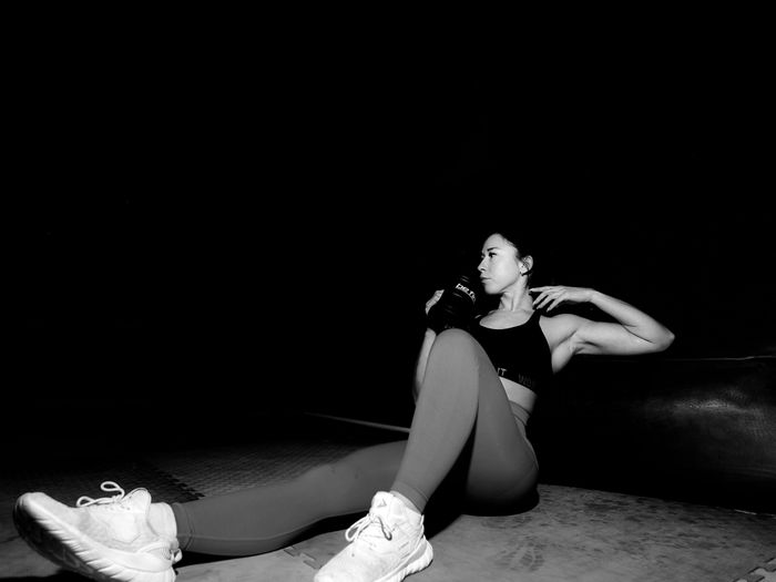 Woman in sportswear training in a gym