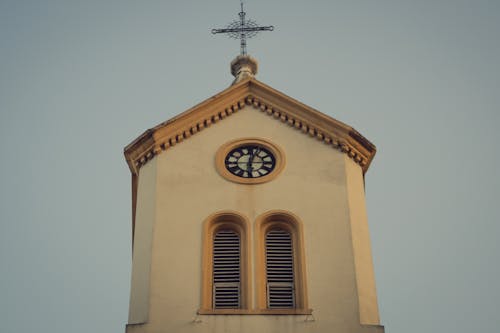 A church with a clock on top of it