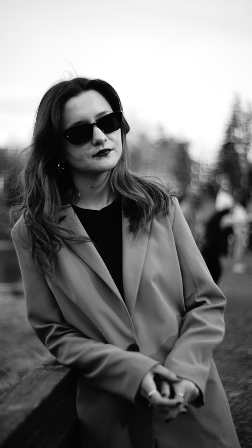 Woman in Sunglasses and Coat
