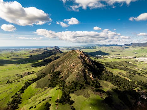 Drone capture of the lush green hills in San Luis Obispo, California.