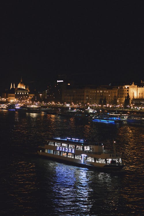 Ferry on the Danube River in Budapest at Night