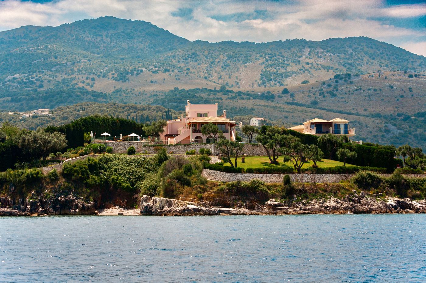 A villa on a hillside on Corfu with mountain and sea views