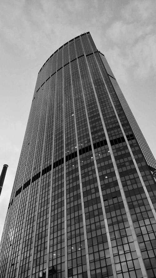 A black and white photo of a tall building