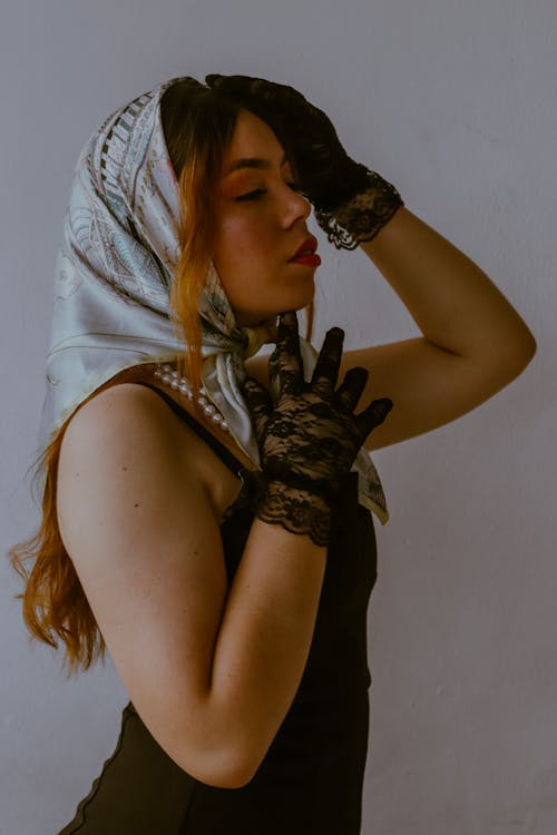 Portrait of Woman in Handkerchief and Gloves