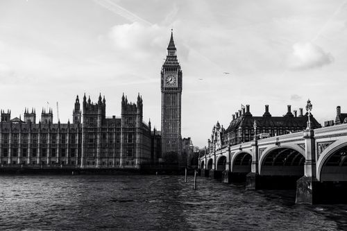 Free Black and white photo of Big Ben and Westminster Bridge over the River Thames in London. Stock Photo