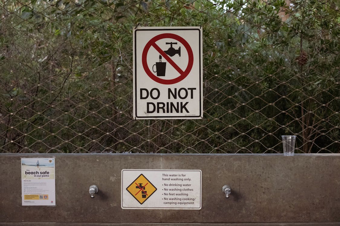 A Sign on a Fence