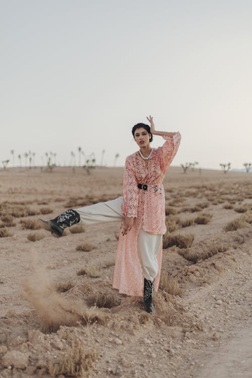 Fashionable Woman Posing in a Desert