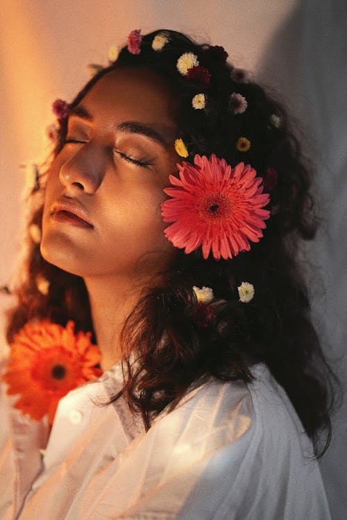 Young Woman with Flowers Woven into Her Hair