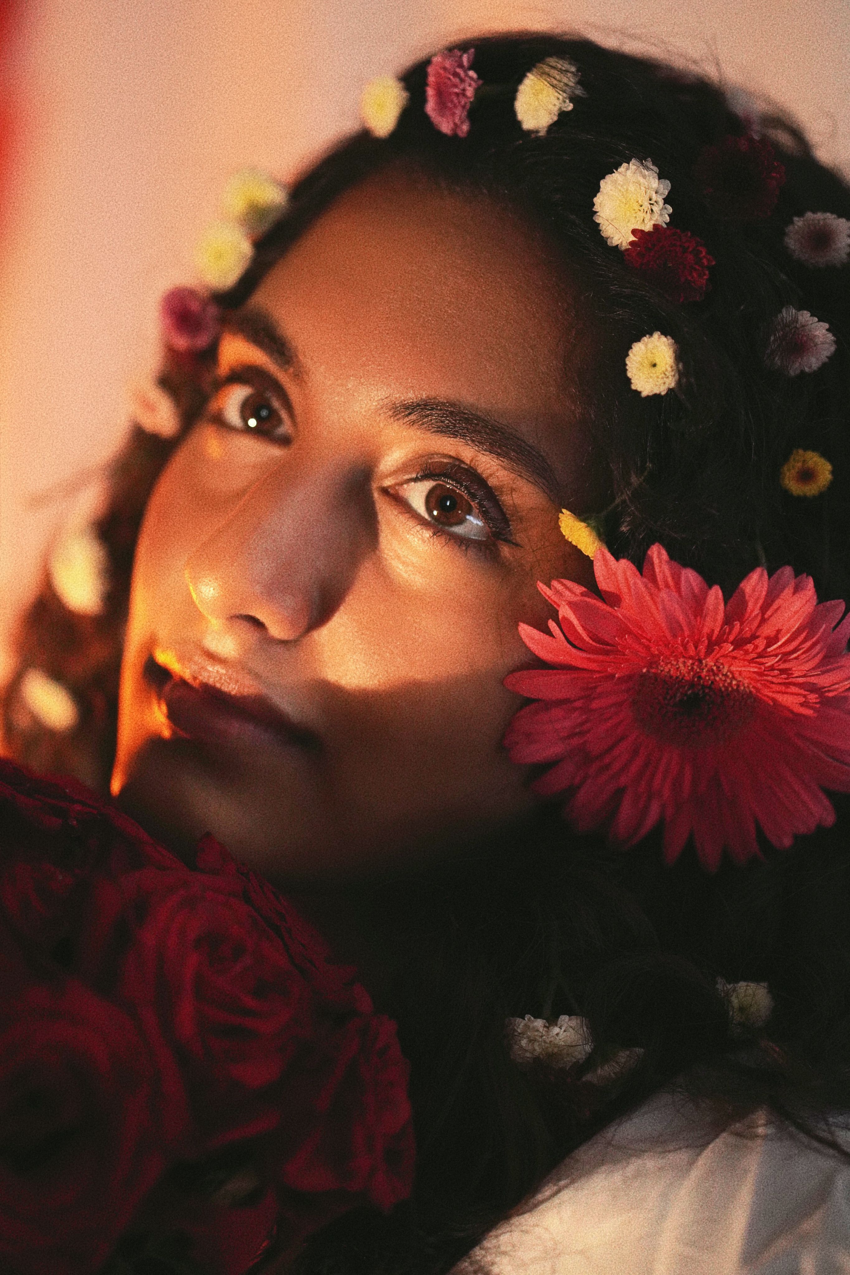 Portrait of a Young Woman with Flowers in Her Hair and a Bouquet of ...