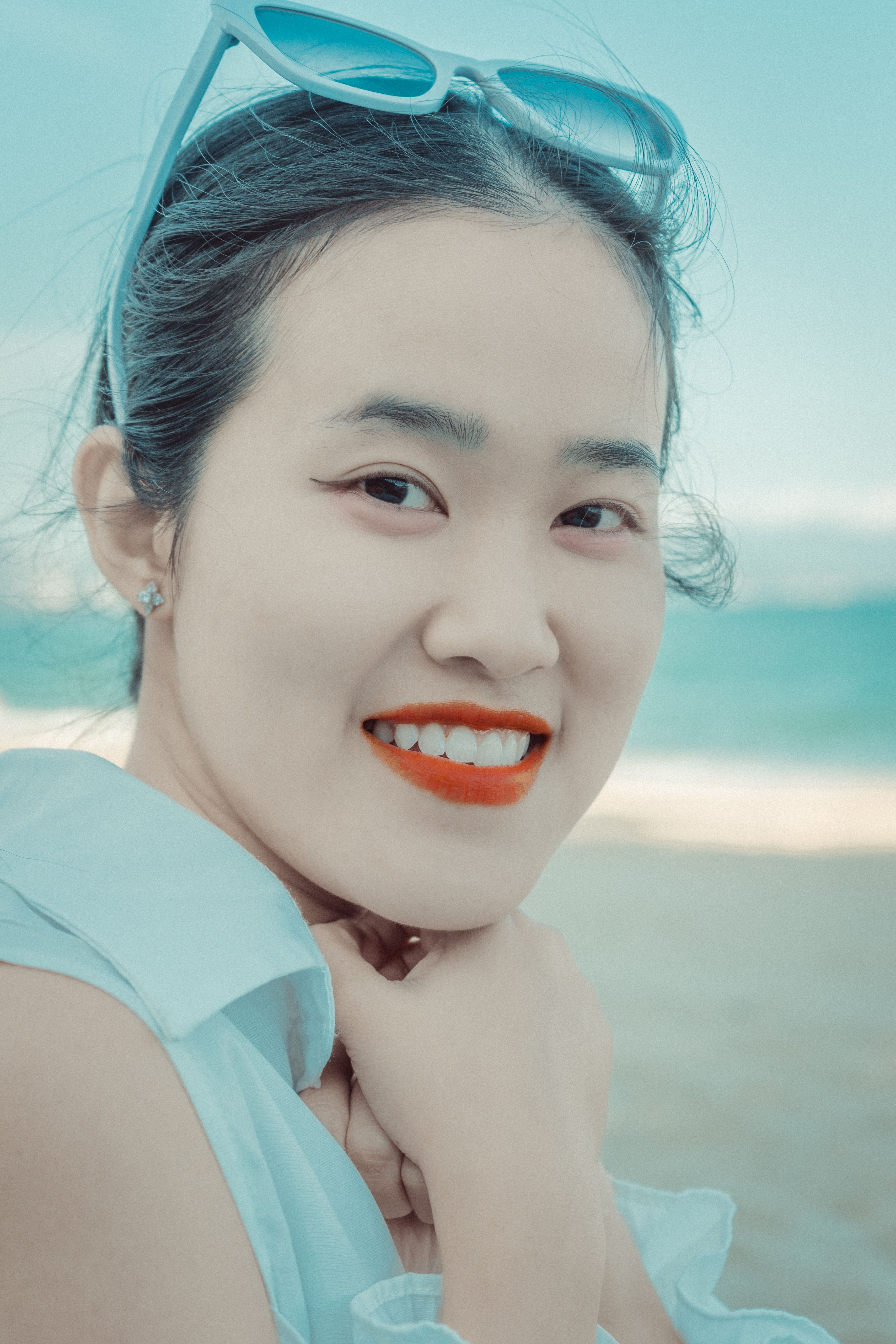 Smiling Young Woman on the Beach · Free Stock Photo