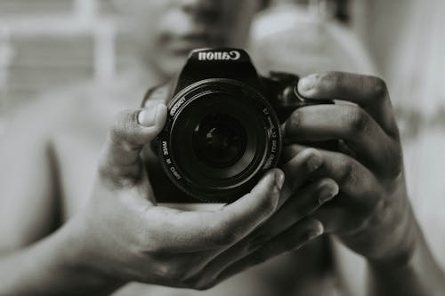 A Person Holding a Camera