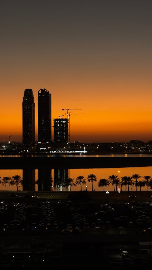 A sunset over the city of dubai with buildings