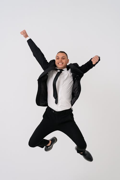 Jumping Man Wearing a Suit 