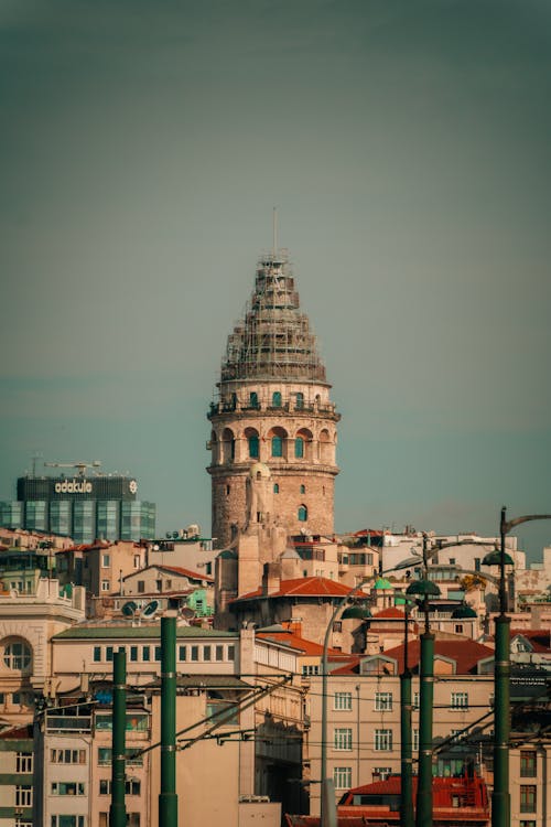 A tower in the city with a clock on top