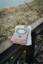 Book Placed on a Fence