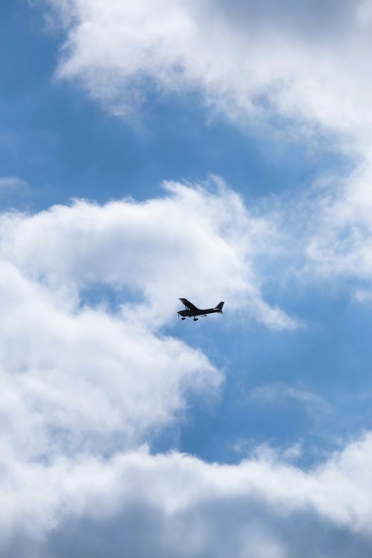 Small High Wing Airplane In Flight