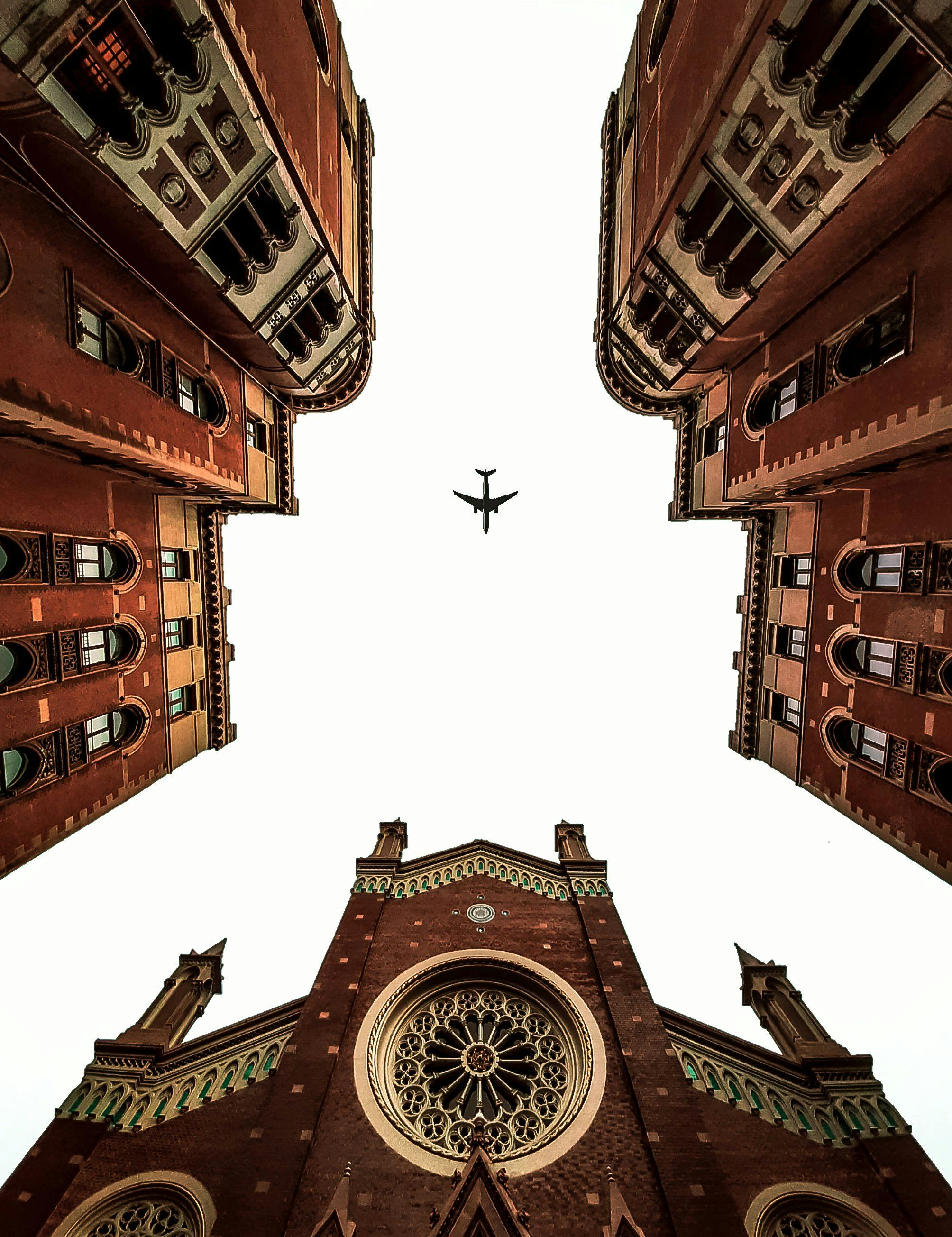 A plane flying over the stunning architecture of a historical church in Istanbul, Turkey.
