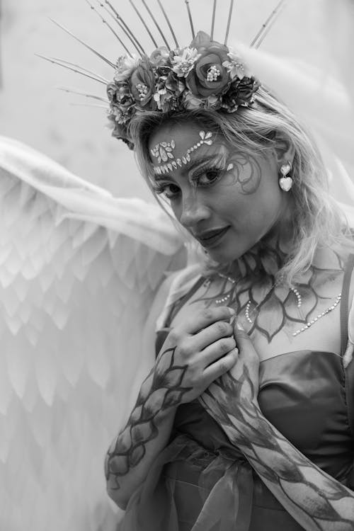 Portrait of Woman Wearing Angel Costume in Black and White