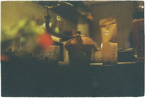 A photo of a tea pot and a vase