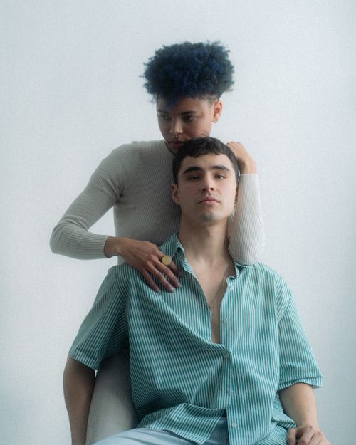 Free Artistic portrait of a stylish couple in contemporary fashion with a soft aesthetic. Stock Photo