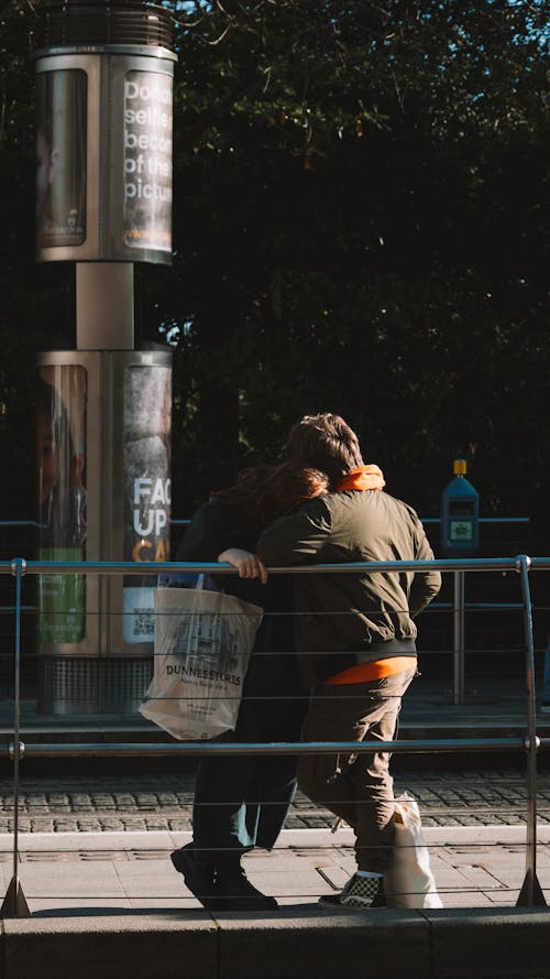 Woman Resting Her Head on Her Boyfriends Shoulder