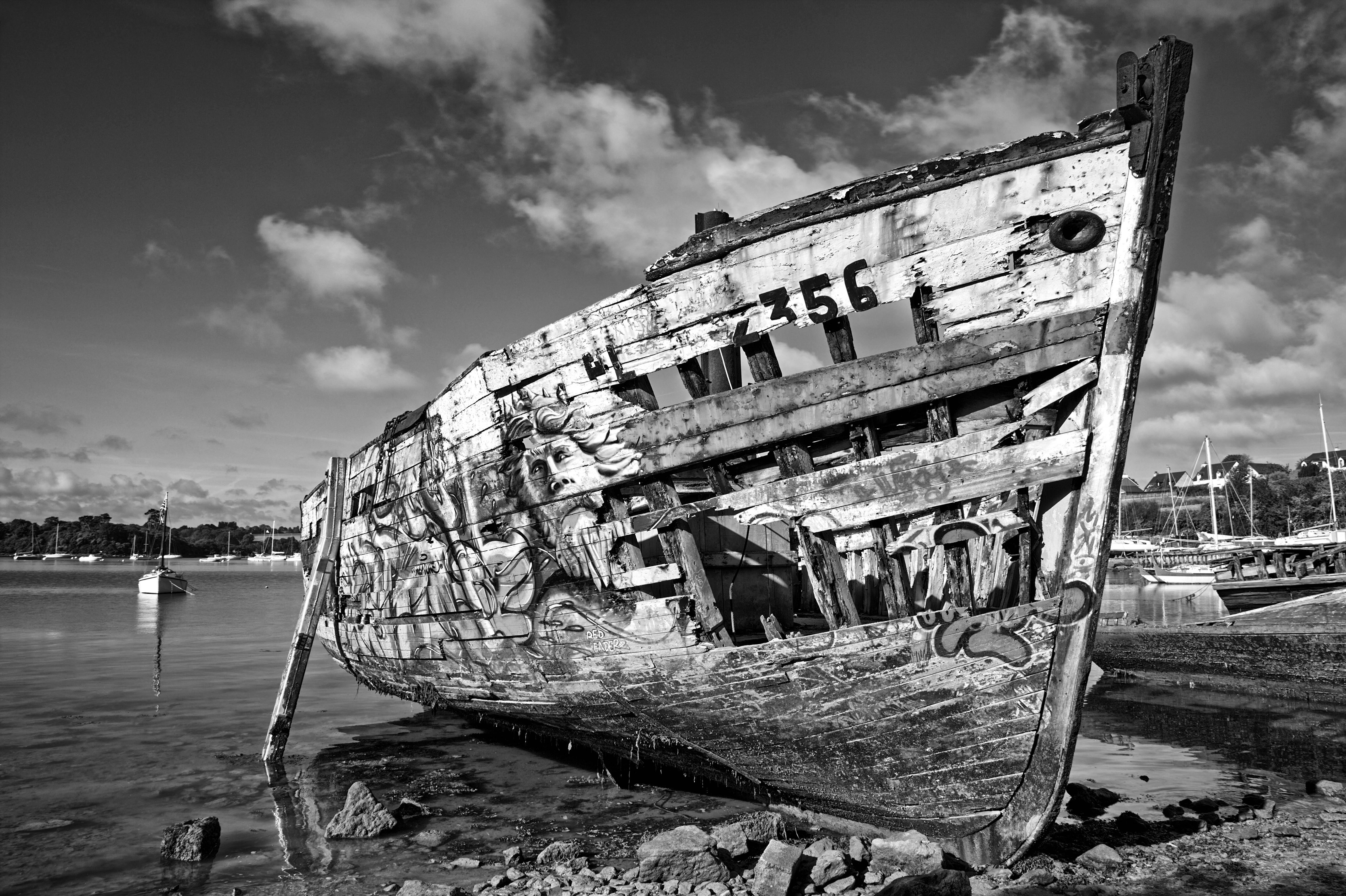 shipwreck covered in graffiti