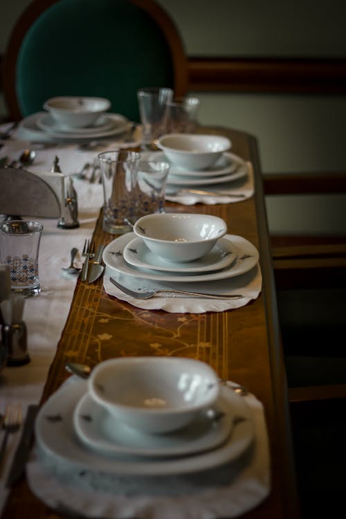 A table set for dinner with plates and silverware