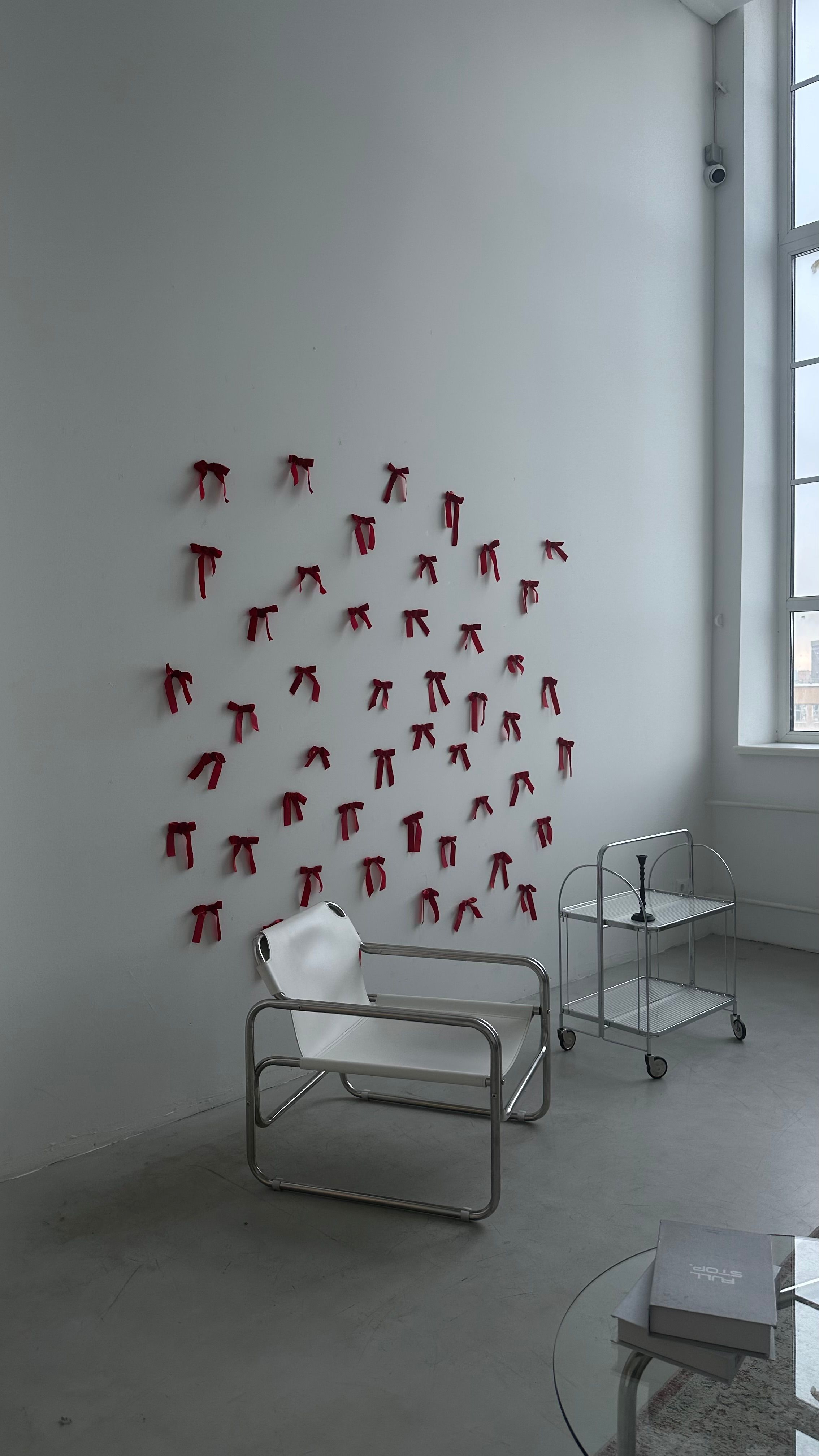 Red Ribbons on a Wall · Free Stock Photo