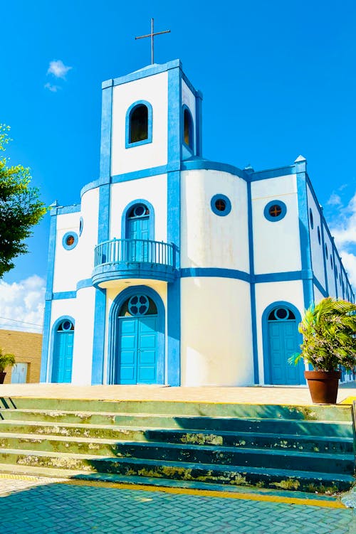 A church with blue and white trim on the front