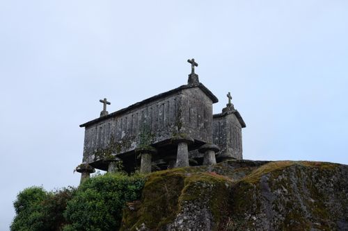 Free Espigueiro granary on a rocky hill in Gerês, showcasing historical stone architecture. Stock Photo