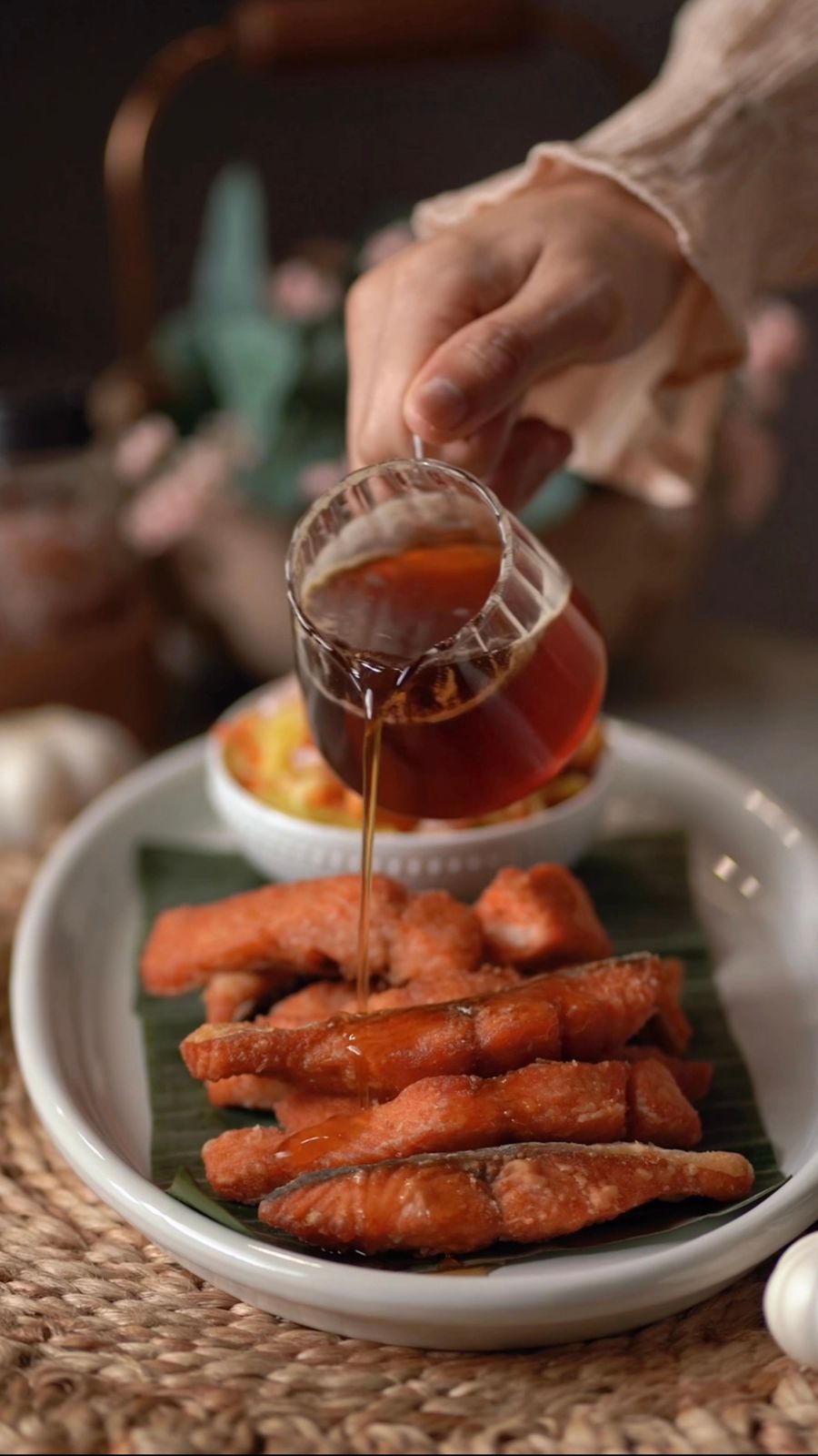 Salmon glaze recipes — honey garlic glaze being spooned over pan-seared salmon