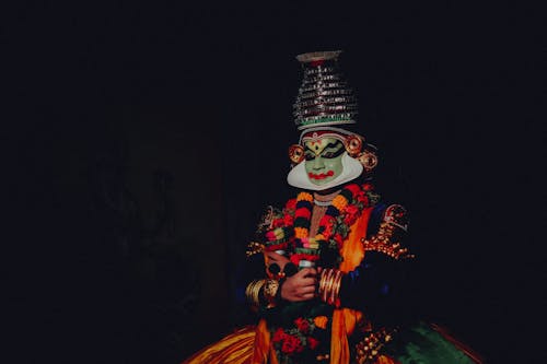 Person in Colorful, Traditional Clothing
