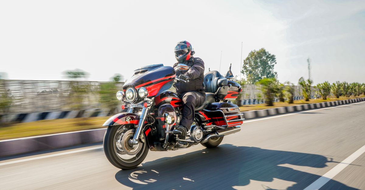 Person Riding Harley Man Riding Harley-Davidson on Road · Free Stock Photo